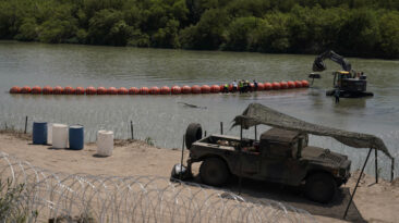 Department of Justice to sue Texas over floating Rio Grande border wall after the state refused to comply with a request to remove the barricade.