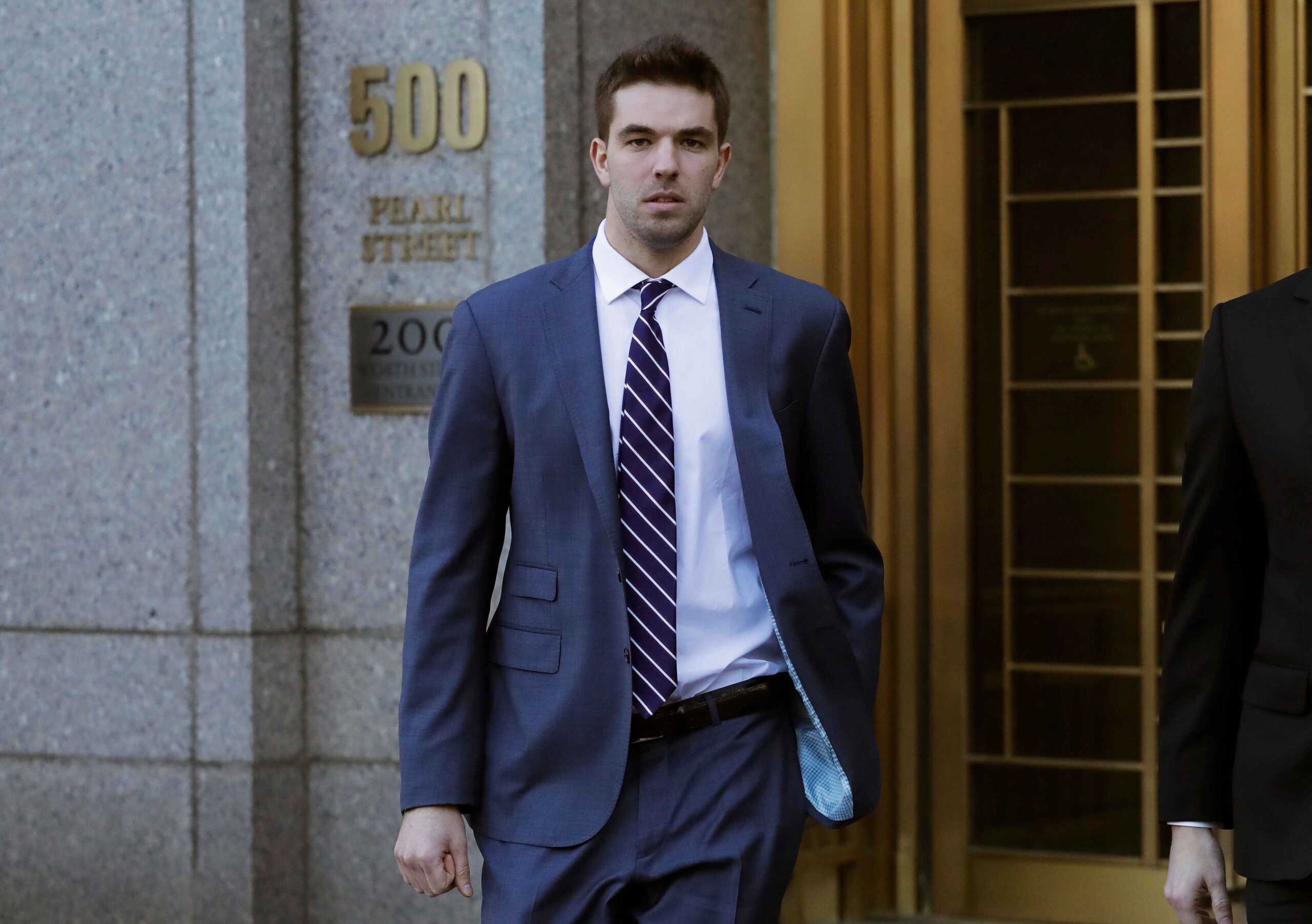 Billy McFarland, the promoter of the failed Fyre Festival in the Bahamas, leaves federal court after pleading guilty to wire fraud charges, Tuesday, March 6, 2018, in New York. He faces a sentence of 8 to 10 years. (AP Photo/Mark Lennihan)
