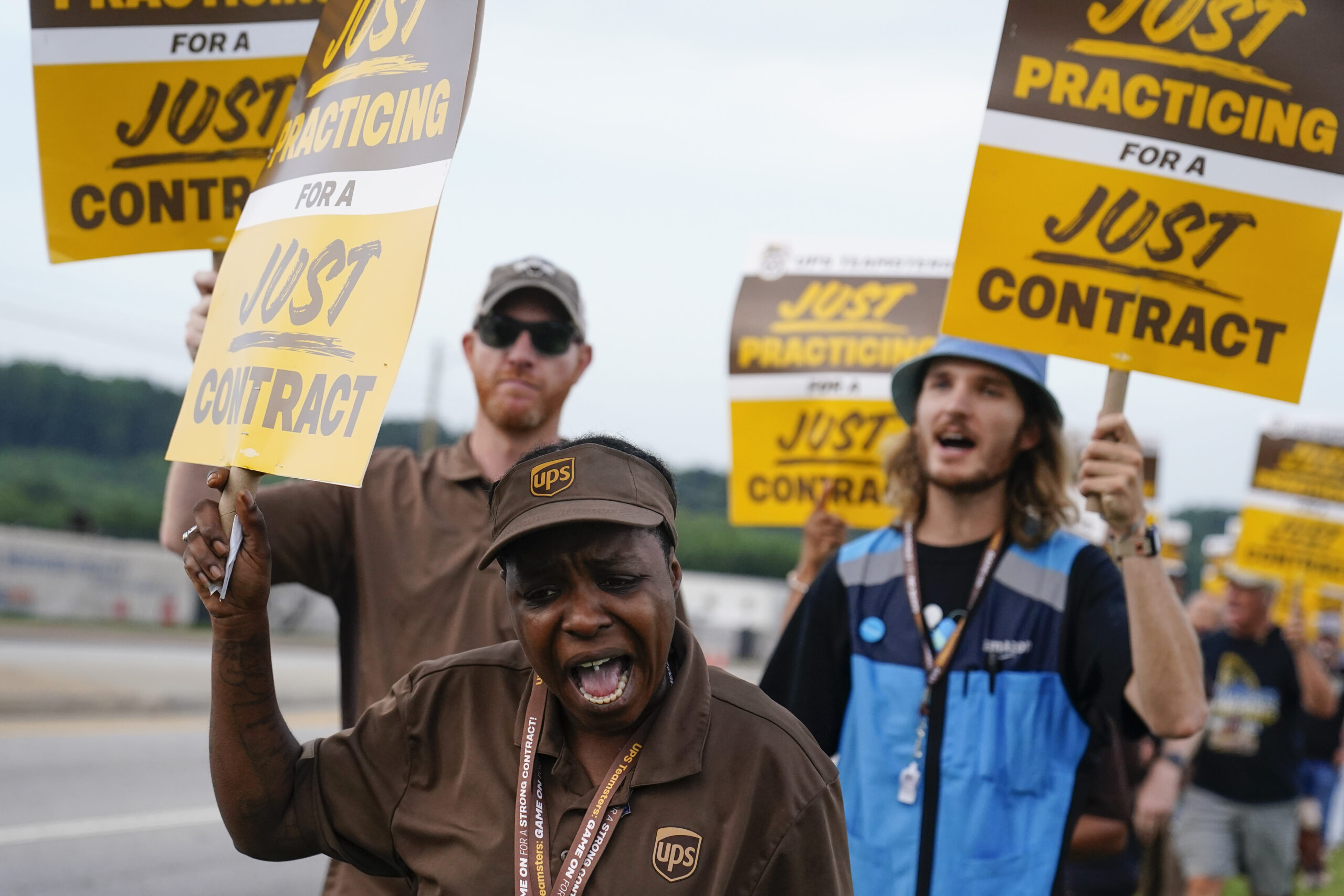 With a new Teamsters contract set to give UPS drivers a salary of $170,000 per year, interest in working for the delivery company is at an all-time high. (AP Photo/Brynn Anderson)