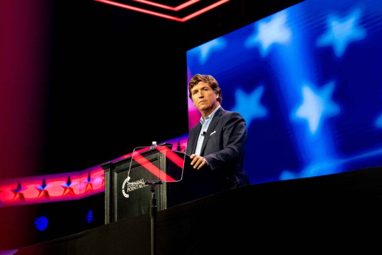 Tucker Carlson traveled to Hungary where he apologized for Biden Ambassador David Pressman's "cultural imperialism" during his speeches on the state of America.