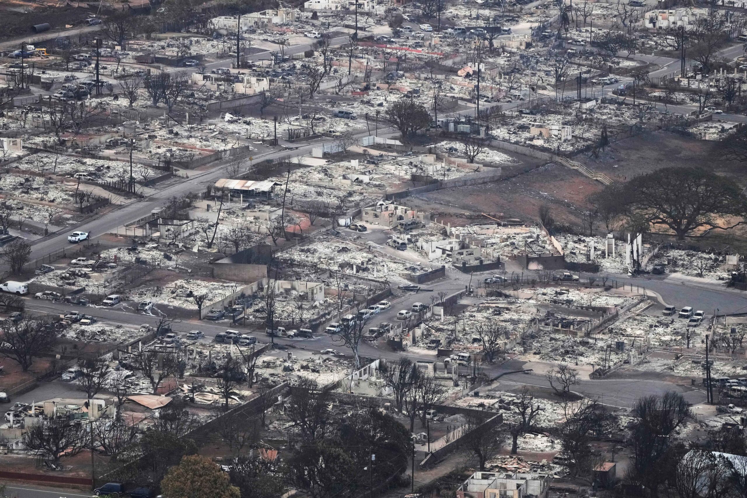 Wildfire wreckage is shown Thursday, Aug. 10, 2023, in Lahaina, Hawaii. (AP Photo/Rick Bowmer). President Joe Biden and First Lady Jill Biden will visit the island of Maui on Monday to survey the damage from last week's wildfire that killed 106 people.