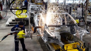 German factories reported a 11.7% decrease in orders for the month of July, much worse than the roughly 4% decline anticipated by economists polled in surveys. (AP Photo/Pavel Golovkin, Pool)
