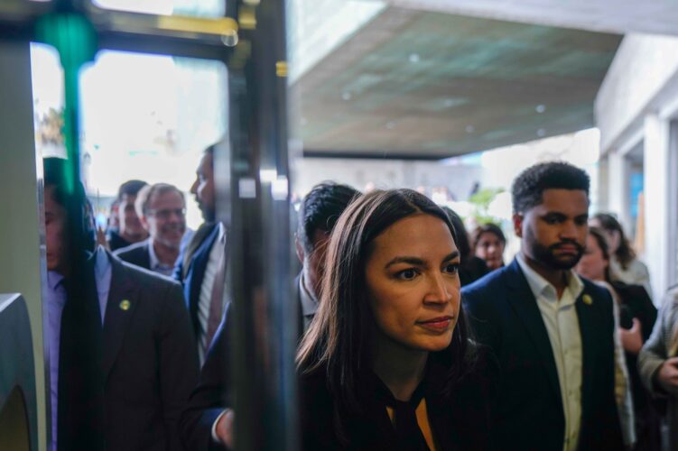 Alexandria Ocasio-Cortez (AOC) was swarmed by protestors in New York City after she denounced Eric Adams for placing limits on migrants.