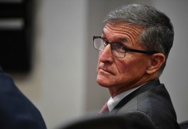 Former National Security Adviser Gen. Michael Flynn called the QAnon conspiracy theory a “major psyop” that is doing a disservice to the American people. (Mike Lang/Sarasota Herald-Tribune via AP, Pool, File)