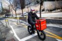 The City of New York has ruled that Uber, DoorDash, and Grubhub must pay deliverers at least $17.96 an hour on Thursday.