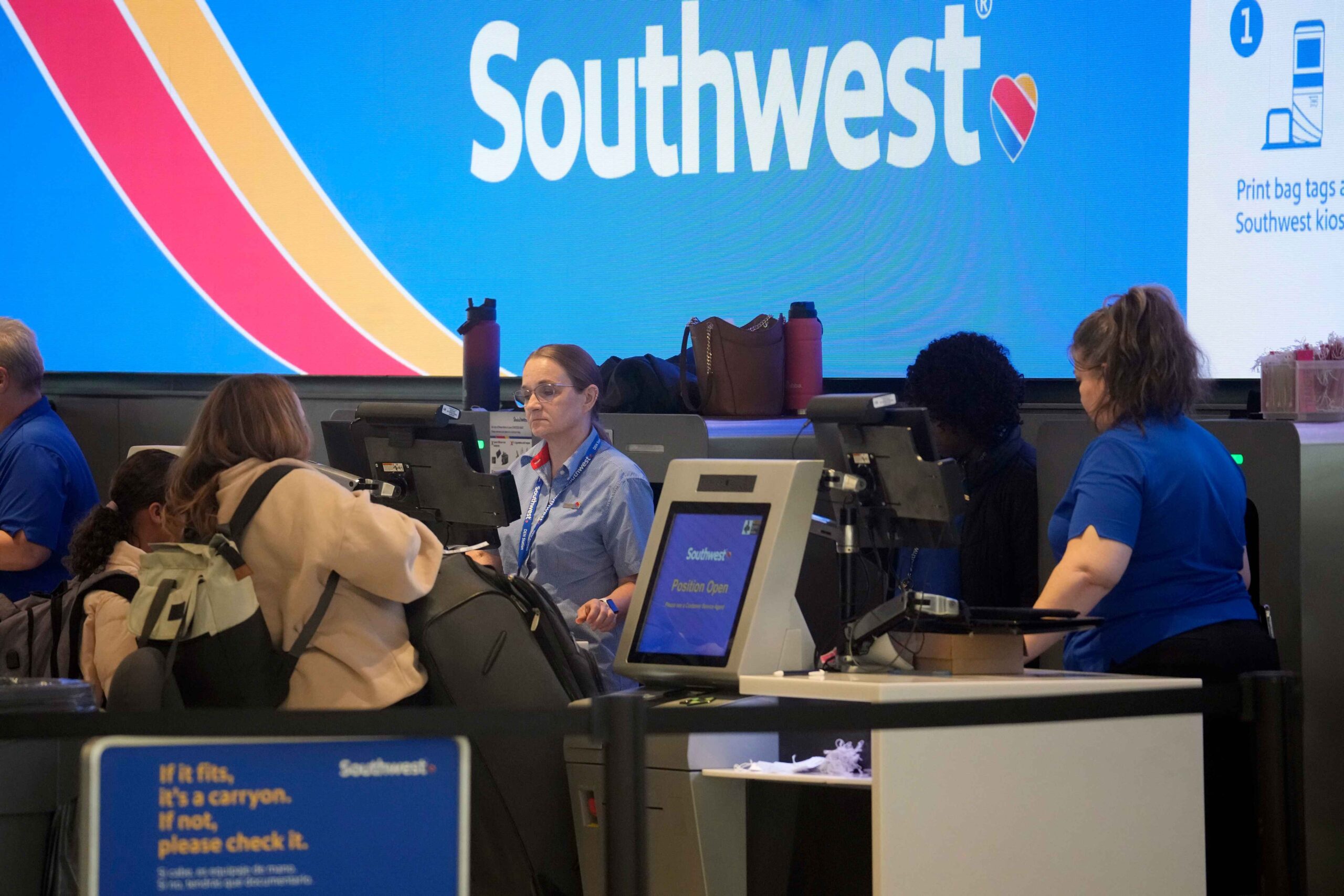 The “Customers of Size” policy from Southwest Airlines provides free extra seats for overweight passengers—even if it means bumping smaller passengers. (AP Photo/David Zalubowski)