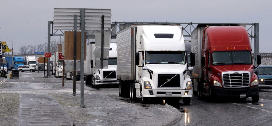 A coalition of truckers is threatening to refuse deliveries to New York City in protest of the $354 million penalty leveled against Donald Trump last week. (AP Photo/Don Ryan)