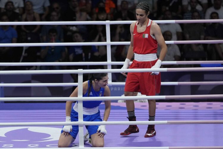 Italian boxer Angela Carini forfeited her Olympic bout against Algeria's Imane Khelif after taking a brutal beating from the allegedly transgender fighter. (AP Photo/John Locher)