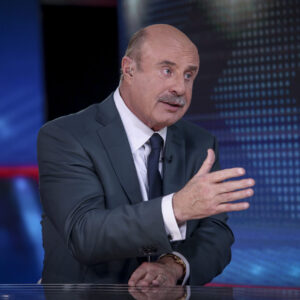 Daytime TV host Dr. Phil McGraw joined ICE officers during a deportation operation in Chicago, accompanying Trump administration "border czar" Tom Homan.