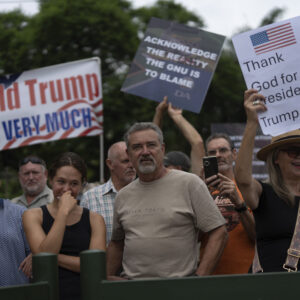 White South Africans gathered outside the US embassy in support of Donald Trump's efforts to cut off aid to South Africa over discrimination against Afrikaners.